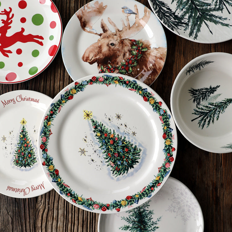 New Christmas ceramic tableware collection: large and small plates, flat and deep dishes, reindeer and Christmas tree patterned tableware.